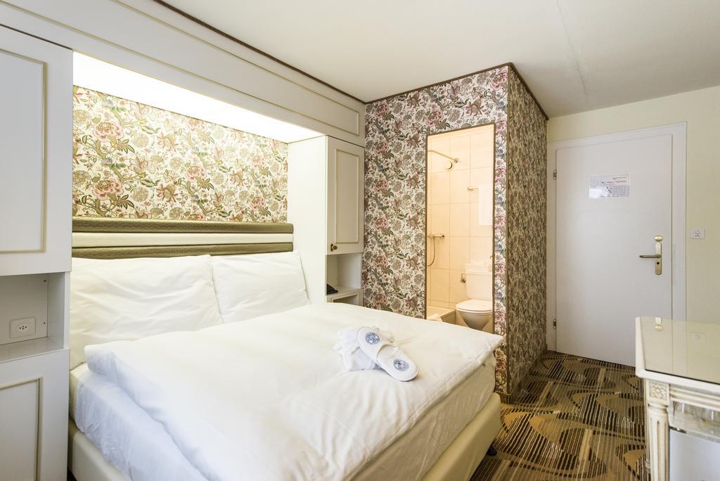 Posthotel Holiday Villa Arosa Oda fotoğraf